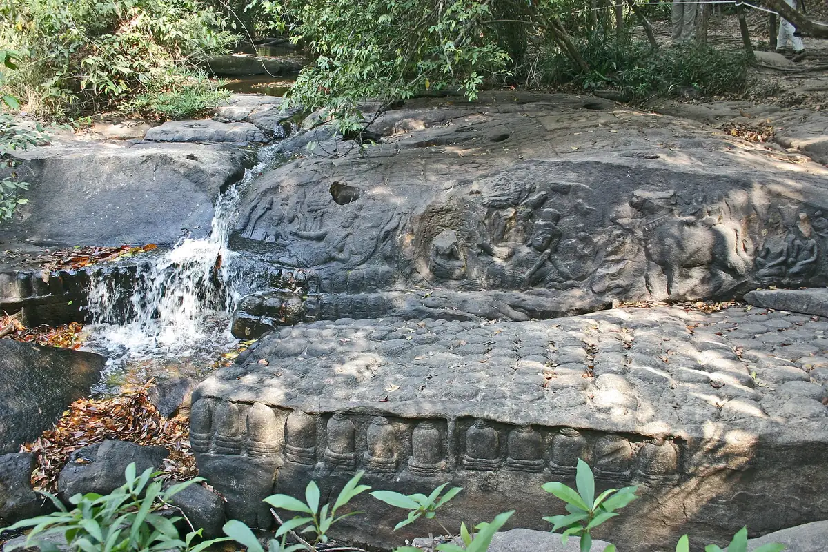 Lingas carved into the riverbed at Kbal Spean on the Phnom Kulen range, seen on Angkor Wat tours from Siem Reap